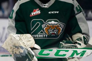 The Everett Silvertips 20th anniversary logo is seen on goalie Braden Holt’s sweater during the season opener against the Vancouver Giants on Saturday, Sep. 24, 2022, at Angel of the Winds Arena in Everett, Washington. (Ryan Berry / The Herald)