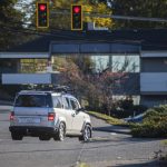 A car signals to take a right turn onto Mukilteo Boulevard while a red light is showing on Friday, Nov. 17, 2023 in Everett, Washington. (Olivia Vanni / The Herald)
