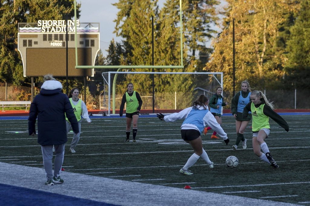 Members of the Shorecrest girls soccer team practice Wednesday at Shoreline Stadium in Shoreline. (Annie Barker / The Herald)