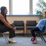 Brooklynn answers questions from reporter Maya Tizon during an interview with the Herald on Monday, Nov. 20, 2023, at Jackson Elementary School in Everett, Washington. (Ryan Berry / The Herald)
