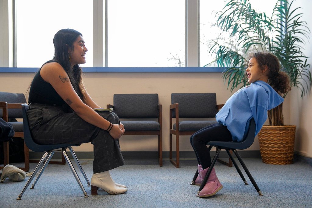 Brooklynn answers questions from reporter Maya Tizon during an interview with the Herald on Monday, Nov. 20, 2023, at Jackson Elementary School in Everett, Washington. (Ryan Berry / The Herald)