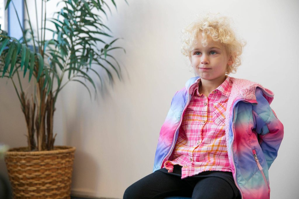 Emmae thinks about a a question during an interview with the Herald on Monday, Nov. 20, 2023, at Jackson Elementary School in Everett, Washington. (Ryan Berry / The Herald)