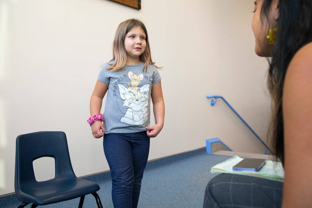 Madison heads back to class after an interview with the Herald on Monday, Nov. 20, 2023, at Jackson Elementary School in Everett, Washington. (Ryan Berry / The Herald)