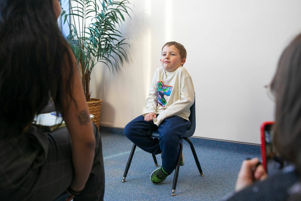 Thomas shrugs in response to a question during an interview with the Herald on Monday, Nov. 20, 2023, at Jackson Elementary School in Everett, Washington. (Ryan Berry / The Herald)