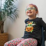 Stormie laughs at a question during an interview with the Herald on Monday, Nov. 20, 2023, at Jackson Elementary School in Everett, Washington. (Ryan Berry / The Herald)