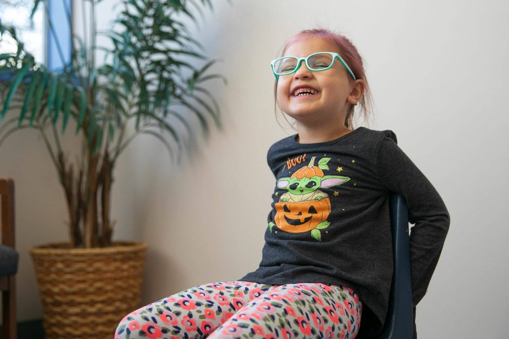 Stormie laughs at a question during an interview with the Herald on Monday, Nov. 20, 2023, at Jackson Elementary School in Everett, Washington. (Ryan Berry / The Herald)