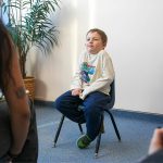 Thomas shrugs in response to a question during an interview with the Herald on Monday, Nov. 20, 2023, at Jackson Elementary School in Everett, Washington. (Ryan Berry / The Herald)