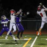 Kennedy Catholics Dante Saladino (8) intercepts the ball during a game between Lake Stevens and Kennedy Catholic at Lake Stevens High School in Lake Stevens, Washington on Friday, Nov. 17, 2023. Lake Stevens won, 44-21. (Annie Barker / The Herald)