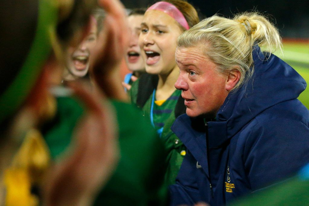 Shorecrest head coach Mindy Dalziel congratulates her team on reaching the state finals after a victory over Lakeside during the WIAA 3A Girls Soccer Semifinal on Friday, Nov. 17, 2023, at Carl Sparks Stadium in Puyallup, Washington. (Ryan Berry / The Herald)