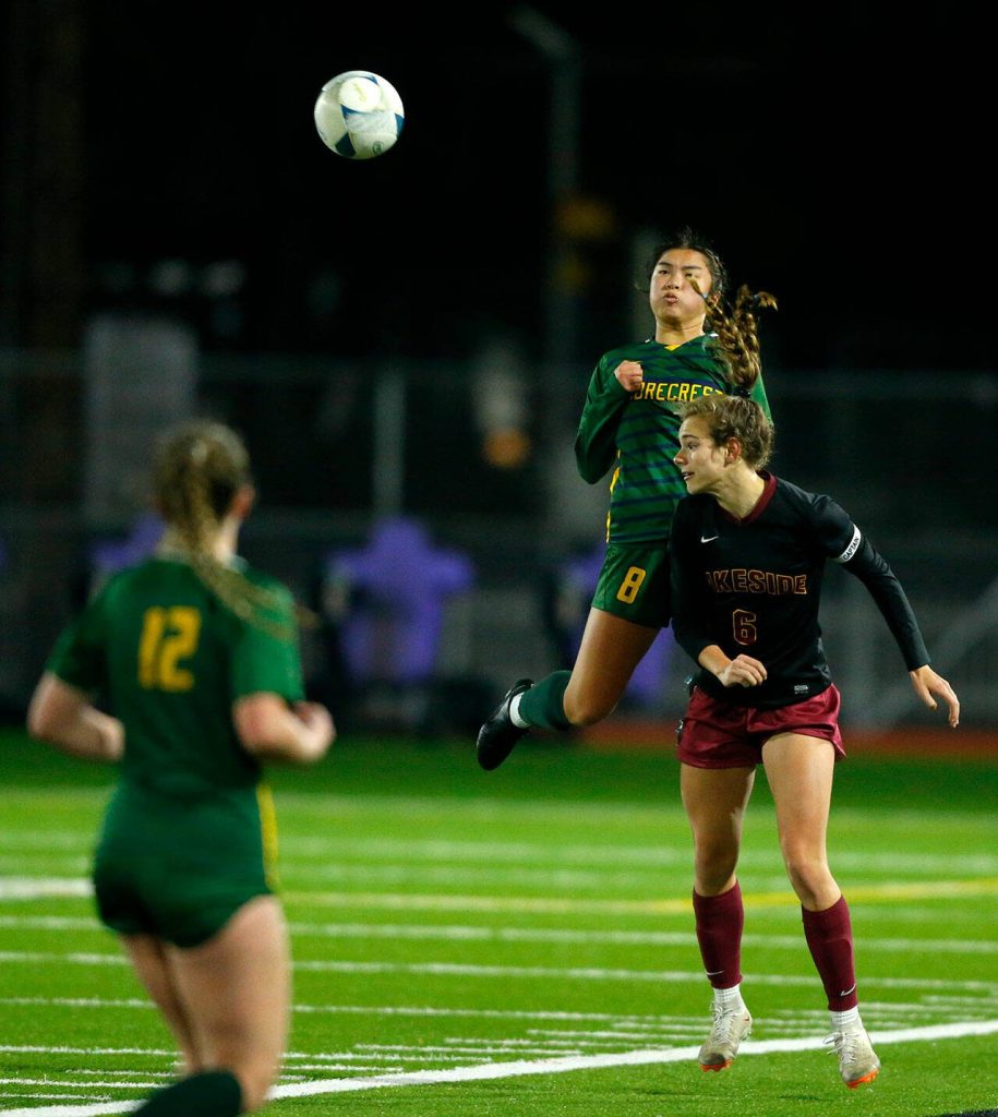 Shorecrest senior Tayvi Khann goes up to head the ball away against Lakeside during the WIAA 3A Girls Soccer Semifinal on Friday, Nov. 17, 2023, at Carl Sparks Stadium in Puyallup, Washington. (Ryan Berry / The Herald)