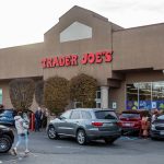 Trader Joes customers walk in and out of the store on Monday, Nov. 20, 2023 in Everett, Washington. (Olivia Vanni / The Herald)