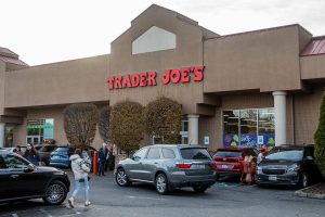 Trader Joe’s customers walk in and out of the store on Monday, Nov. 20, 2023 in Everett, Washington. (Olivia Vanni / The Herald)