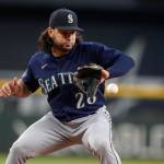 Seattle Mariners third baseman Eugenio Suarez fields a ground ball against the Texas Rangers during a game Sept. 24 in Arlington, Texas. (AP Photo/Tony Gutierrez)