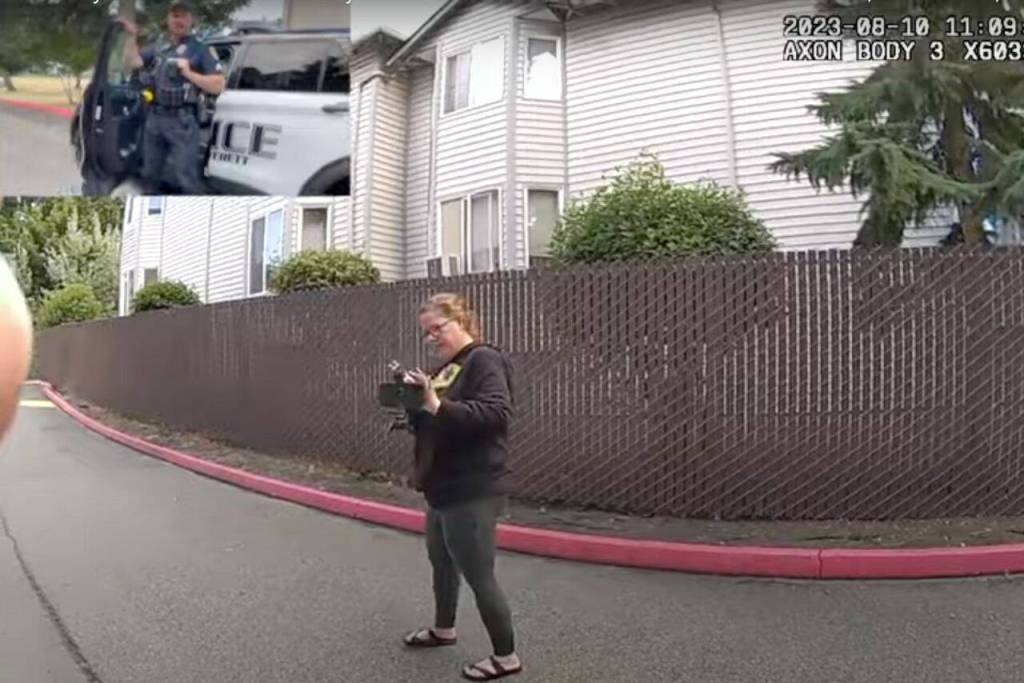 From the bodycam footage of Everett police officer Ryan Greely and footage from Molly Wright, Wright films officer Greely before he arrests her for obstructing a law enforcement officer on Aug. 10, 2023 in Everett, Washington. (Screenshot from a video provided by Molly Wright)