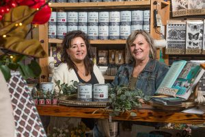 Owners of Country Rose/The Paint Bungalow, Donna Mains (left) and Kathleen Shalan in their shop in October, 2021 in Arlington. The gift store also stocks Annie Sloan paint as well as being a women's apparel boutique. (Andy Bronson / The Herald file photo)