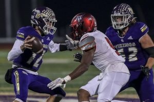 Lake Stevens’ Kolton Matson (12) moves with the ball during a game between Lake Stevens and Kennedy Catholic at Lake Stevens High School in Lake Stevens, Washington on Friday, Nov. 17, 2023. Lake Stevens won, 44-21. (Annie Barker / The Herald)