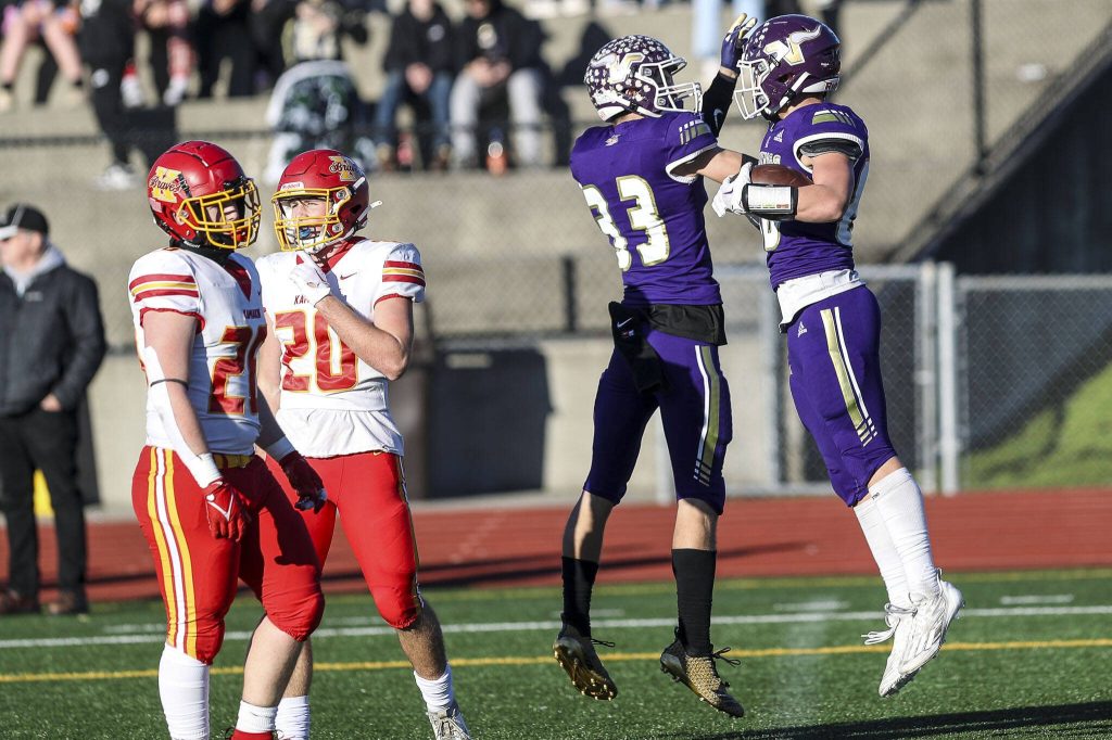 Annie Barker / The Herald
Lake Stevens players celebrate Saturday. Theyll play for the state 4A title Saturday at Husky Stadium.