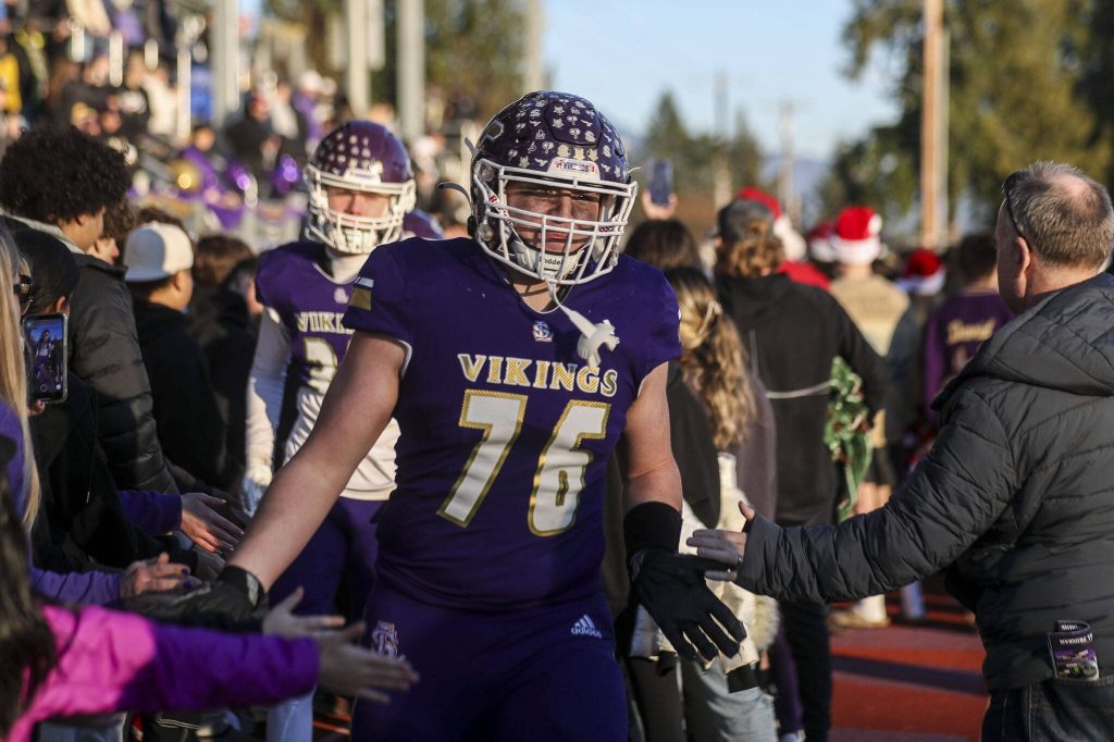 Lake Stevens players celebrate during a Class 4A state semifinal game between Lake Stevens and Kamiakin at Lake Stevens High School in Lake Stevens, Washington on Saturday, Nov. 25, 2023. Lake Stevens won, 48-7. (Annie Barker / The Herald)