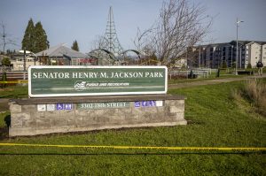 Police tape winds around Henry Jackson Park in Everett, Washington on Sunday, Nov. 26, 2023.  (Annie Barker / The Herald)