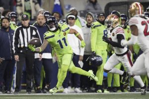 Seattle Seahawks wide receiver Jaxon Smith-Njigba (11) makes a one-handed catch during an NFL football game against the San Francisco 49ers, Thursday, Nov. 23, 2023 in Seattle. The 49ers won 31-13. (AP Photo/Ben VanHouten)