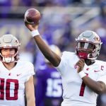 Washington State quarterback Cameron Ward (1) throws during warmups before a game against Washington on Nov. 25 in Seattle. (AP Photo/Lindsey Wasson)
