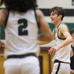 Jacksons Ryan Mcferran smiles after beating Arlington on Tuesday, Nov. 28, 2023 in Everett, Washington. (Olivia Vanni / The Herald)