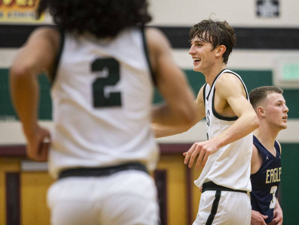 Jacksons Ryan Mcferran smiles after beating Arlington on Tuesday, Nov. 28, 2023 in Everett, Washington. (Olivia Vanni / The Herald)