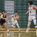 Jacksons Trey Hawkins gets a fast break during the game against Arlington on Tuesday, Nov. 28, 2023 in Everett, Washington. (Olivia Vanni / The Herald)