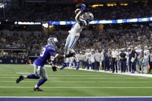 Dallas Cowboys wide receiver Brandin Cooks (3) catches a pass for a first down as Seattle Seahawks safety Jamal Adams (33) defends in the first half of Thursdays game in Arlington, Texas. (AP Photo/Roger Steinman)