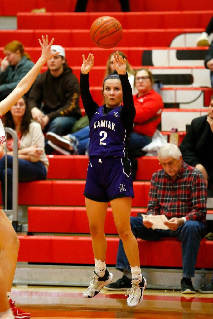 Kamiaks Finley Gonzalez hits a three against Stanwood on Thursday, Nov. 30, 2023, at Stanwood High School in Stanwood, Washington. (Ryan Berry / The Herald)