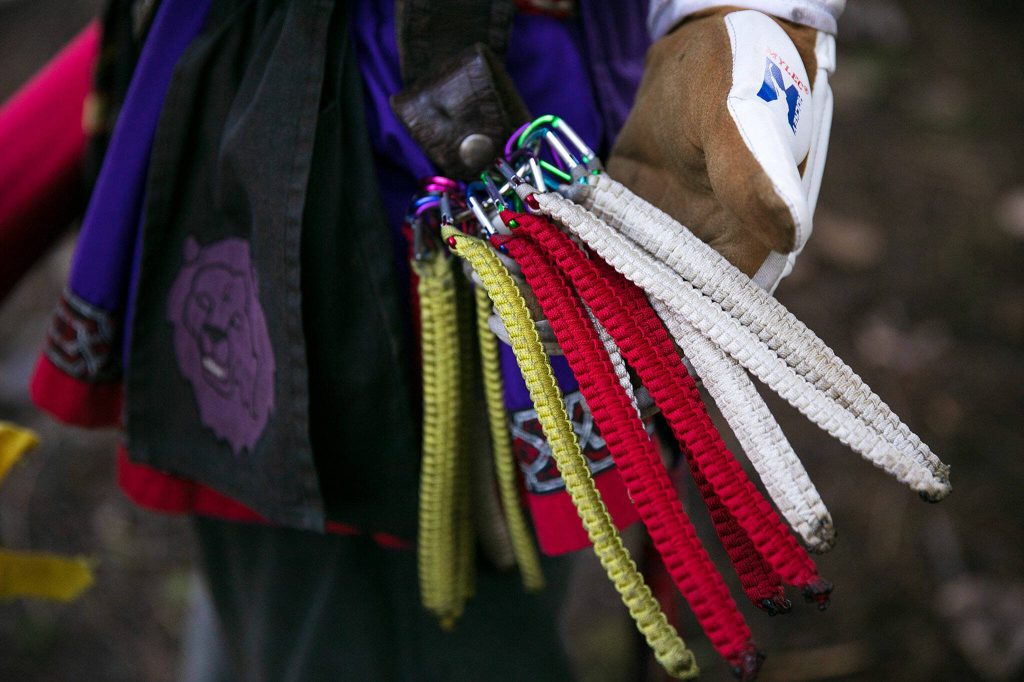 Judson Day, persona Hated, shows off some of their gear during a weekly meeting of the Amtgard LARPing group The Hollow on Jan. 29, at McCollum Park. (Ryan Berry / The Herald)