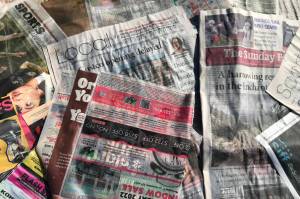 Wet cardboard and old copies of the Herald layer the bottom of Brenda Mann Harrison's no-till garden space. (Brenda Mann Harrison / The Herald)