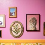 Artwork decorates the womens restroom at Coles Tavern in Mukilteo. The mens room features more toilet-centric decor. (Ryan Berry / The Herald)