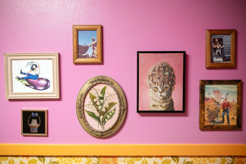 Artwork decorates the womens restroom at Coles Tavern in Mukilteo. The mens room features more toilet-centric decor. (Ryan Berry / The Herald)
