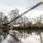 A derelict boat seen in Union Slough on Tuesday, Nov. 21, 2023 in Everett, Washington. (Olivia Vanni / The Herald)