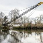 A derelict boat seen in Union Slough on Tuesday, Nov. 21, 2023 in Everett, Washington. (Olivia Vanni / The Herald)