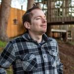 David Woodward poses for a photo at his home in Lake Stevens, Washington on Saturday, Nov. 25, 2023.  (Annie Barker / The Herald)