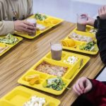 Darrington Elementary School students drink cups of chocolate milk with their lunches on Monday, Nov. 20, 2023 in Darrington, Washington. (Olivia Vanni / The Herald)