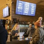 Customers order beer at Haywire Brewing Company on Wednesday, Nov. 29, 2023 in Snohomish, Washington. (Olivia Vanni / The Herald)