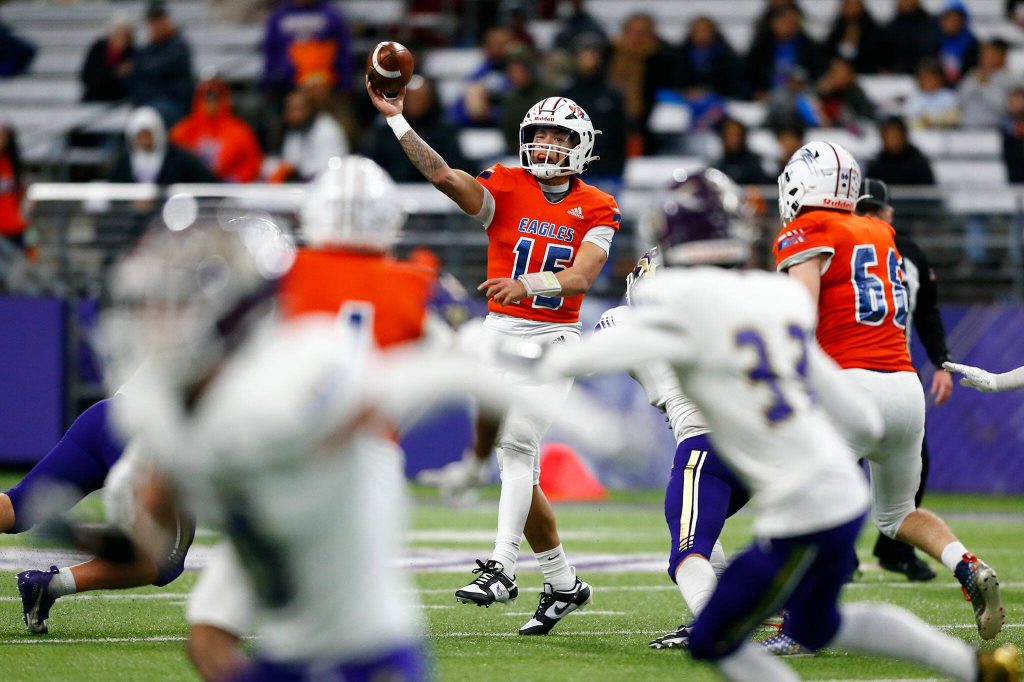 Graham-Kapowsin quarterback Daveon Superales throws into coverage against Lake Stevens during the WIAA 4A Football State Championship on Saturday, Dec. 2, 2023, at Husky Stadium in Seattle, Washington. (Ryan Berry / The Herald)