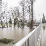 A man walks across the Sultan River pedestrian bridge on Tuesday, Dec. 5, 2023 in Sultan, Washington. (Olivia Vanni / The Herald)