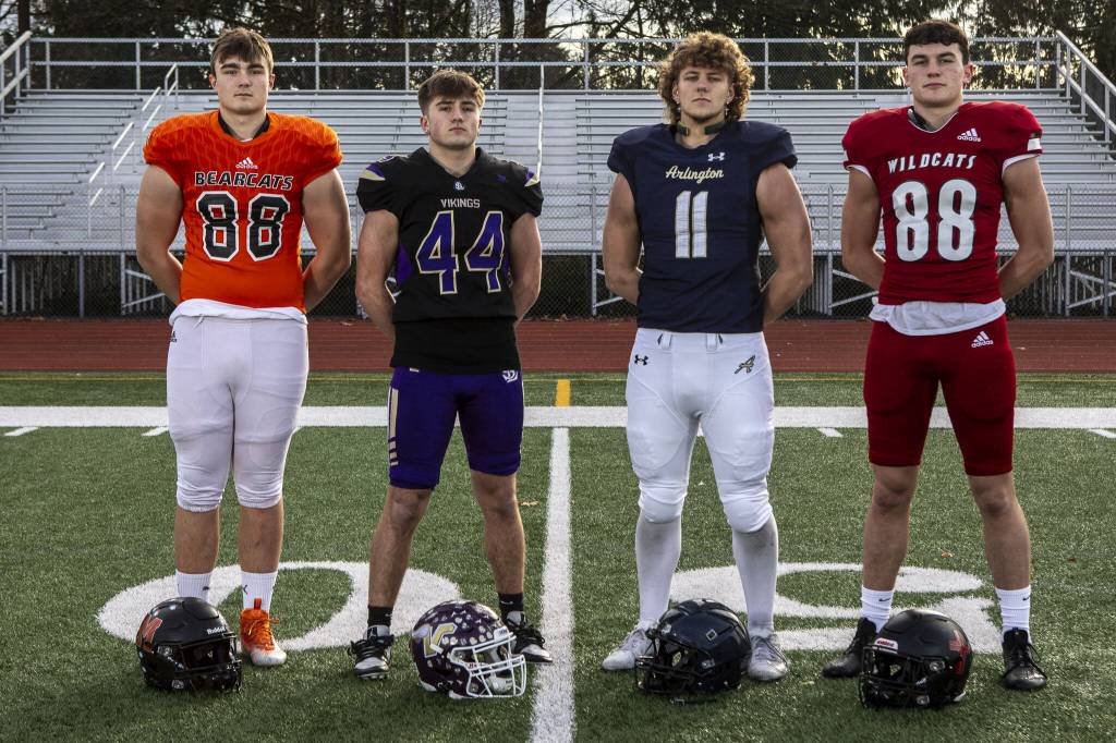Left to right, Brennan Sheppard (88), Gage Solomon (44), Jeremy Fleming (11), and Jack Sievers (88) on Dec. 17 at Lake Stevens High School. (Annie Barker / The Herald)