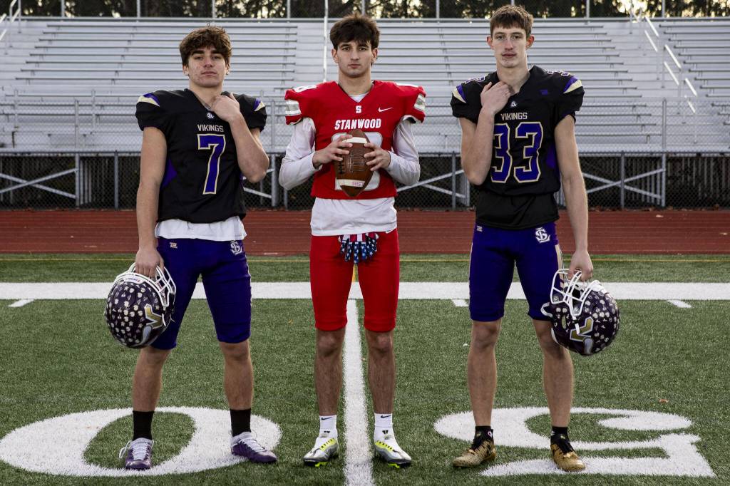 Left to right, Gabe Kylany (7), Max Mayo (18), and David Brown (33) on Dec. 17 at Lake Stevens High School. Not pictured: Glacier Peaks Isaiah Cuellar (Annie Barker / The Herald)