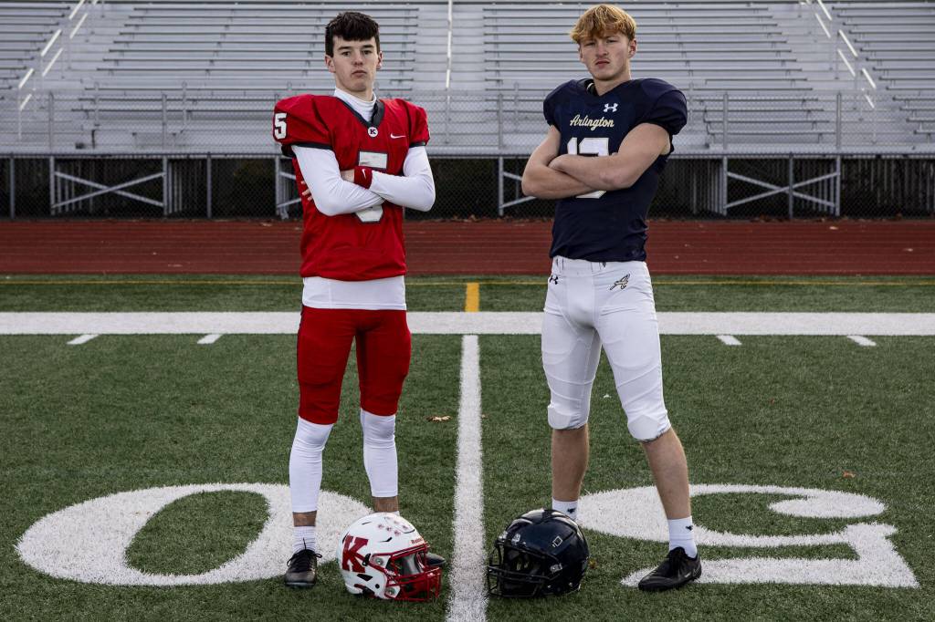Matthew Williams (5) and Aidan Raney (12) on Dec. 17 at Lake Stevens High School.(Annie Barker / The Herald)