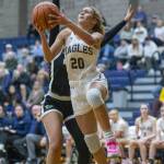 Arlingtons Samara Morrow attempts a layup during the game against Lynnwood on Monday, Dec. 11, 2023 in Arlington, Washington. (Olivia Vanni / The Herald)
