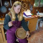 Besides stained glass pieces, Mackensie Bennett also weaves baskets from pine needles. (Photo by David Welton)