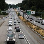 Traffic moves along I-405 between Highway 522 and Highway 527 where WSDOT received the approval to build a second express toll lane on Friday, Aug. 20, 2021 in Bothell, Wash. (Olivia Vanni / The Herald)
