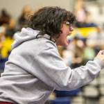 A Cascade wrestler cheers on their teammate on Wednesday, Dec. 13, 2023 in Everett, Washington. (Olivia Vanni / The Herald)