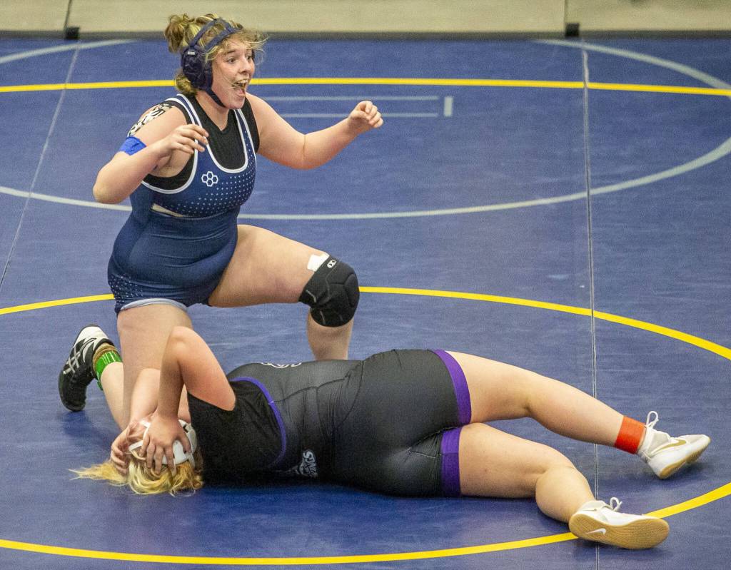 Arlingtons Katie Wheeler reacts to beating Lake Stevens Anna Cappel on Wednesday, Dec. 13, 2023 in Everett, Washington. (Olivia Vanni / The Herald)