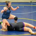 Arlington’s Katie Wheeler reacts to beating Lake Steven’s Anna Cappel on Wednesday, Dec. 13, 2023 in Everett, Washington. (Olivia Vanni / The Herald)